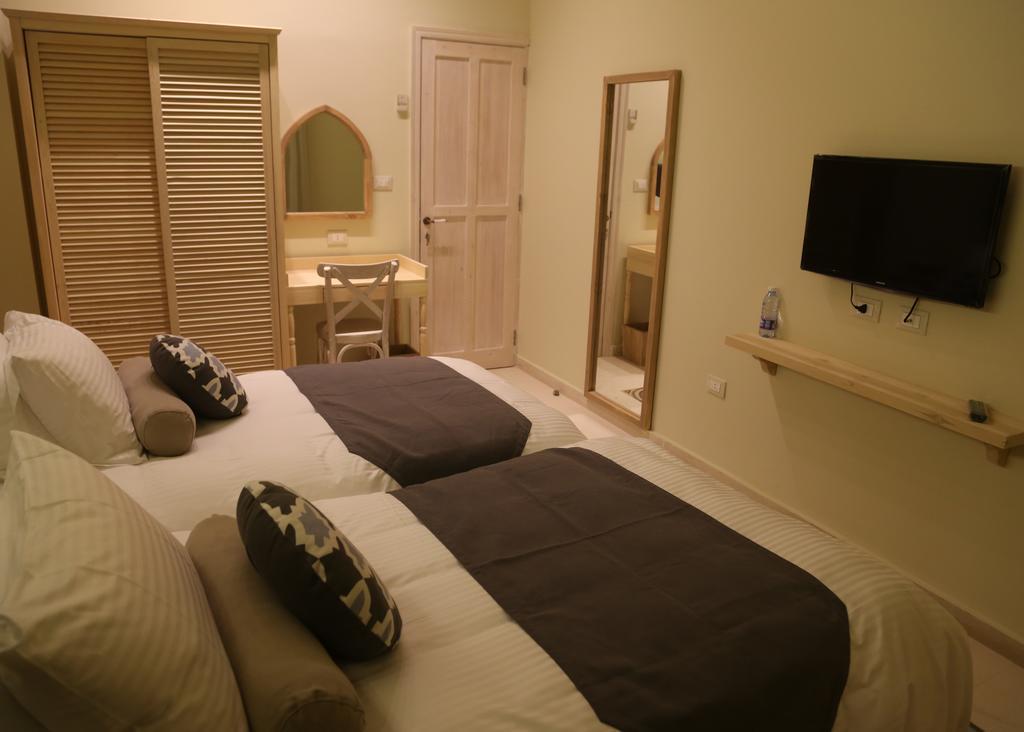 Hotel Dar Alma Tyros Pokoj fotografie